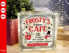 frosty glass block with frosty's cafe advertisement