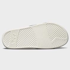 Comfort is at an all-time high with the APL Big Logo TechLoom Slide. Featuring a soft and flexible TechLoom strap with mesh lining, your feet will thank you every time you slip them on. The antimicrobial mesh footbed covers a 3D molded footbed that massages your feet with every step. The newly developed midsole/outsole uses our tried and true Propelium compound offering the same great cushioning and rebound from the running shoes you love. Whether you want to recover after a great workout or giv Apl Shoes, Mens Slides, Coastal Blue, Blue Moonstone, Womens Slides, Tried And True, Blue Ivory, Nappa Leather, Relaxed Style