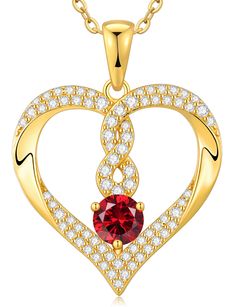 a heart shaped pendant with a red crystal stone in the center and white diamonds around it