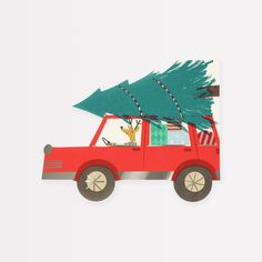 a red car with a christmas tree on the roof is shown in front of a white background