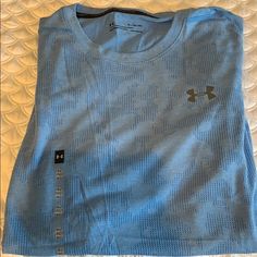 New With Tags. Fitted Heat Gear. Short Sleeve Smoke Free Home. Casual Blue Under Armour T-shirt, Casual Blue Under Armour Top, Blue Casual Top By Under Armour, Casual Blue Top By Under Armour, Football Graphic Tee, Mens Workout Shirts, Mens Short Sleeve Shirt, Under Armour Shirts, Loose Shirts