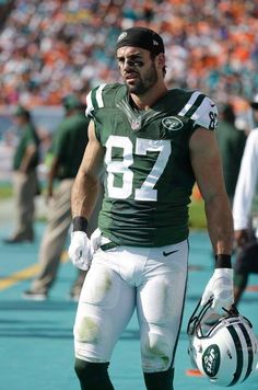 a football player is standing on the field