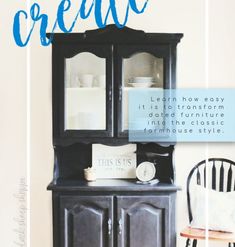 a black china cabinet sitting on top of a hard wood floor