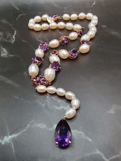 This beautiful vintage necklace is set in 14k yellow gold, has 30 shimmering pearls and 14 beaming amethyst gemstones. Luxury Purple Pearl Necklaces, Pearl Amethyst, Crystal Necklaces, Jade Bracelet, Amethyst Necklace, Emerald Ring, Amethyst Gemstone, Beautiful Bracelet, Vintage Necklace