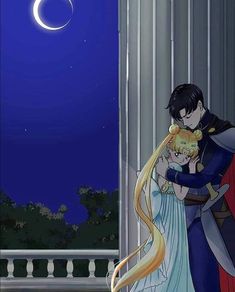 a man and woman are hugging in front of a balcony at night with the moon behind them