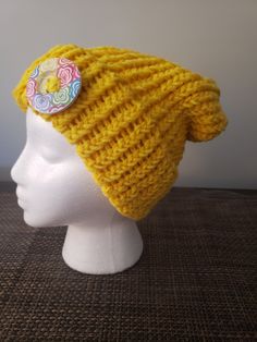 Warm. Sunny. Yellow. 100% acrylic. Who doesn't want to take some sun along with them?  A whimsical button to add just a pop of bling. Sunny Yellow, Knit Beanie, Sunnies, Caps Hats, Accessories Hats, Winter Hats, Sun, Knitting, Hats