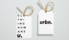 two tags with the words urbn on them