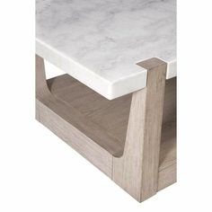 a white marble top and wooden base coffee table with two shelves on each side,