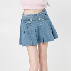 Indulge in the sophistication and elegance of our Women's Preppy Pleated Denim Skirt. Crafted with precision and attention to detail, this skirt features delicate pleats and the finest denim fabric for a luxury feel. Elevate any outfit with this exclusive piece, perfect for the modern woman. Features: -Solid Color -Pleated Design -Regular fit -Preppy style High Waist Pleated Cotton Denim Skirt, High Waist Pleated Denim Skirt In Cotton, High Waist Cotton Denim Pleated Skirt, High-waist Cotton Pleated Denim Skirt, High Waist Pleated Denim Skirt, Chic Pleated Fitted Denim Skirt, Spring Relaxed Denim Skort, Chic Pleated Denim Skirt, Trendy High-waisted Pleated Denim Skirt