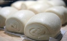 rolls are wrapped in wax paper and ready to be baked into buns or sandwiches