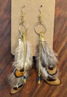 Handmade pheasant feather earrings Diy Feather Earrings, Feather Earrings Diy, Pheasant Feather, Pheasant Feathers, Feather Earrings, Pheasant, Leather Earrings, Halloween Shopping, Jewelry Earrings Dangle