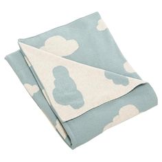 a blue and white blanket with clouds on it