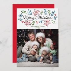 a christmas card with an image of two people and a baby