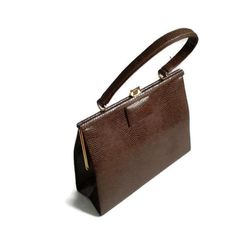 Brown Vintage bags for women. This is a vintage brown handbag. Approximately 1940-1950 years. In a very good condition. Metal Stainless Steel Fittings. Coffee brown bagDimensison:height 20 cm (8 inches) width 25 cm (10 inches) thickness 8 cm (3 inches) length of the handle 35 cm (14 inches)  Vintage bagsfor womenBrown handbags50s kelly bagReptile handbag 40s1950s Reptile PurseEveryday bagTop Handle Bagssmall leathershoulder bagsClassic bagKelly stylesimple handbag Cheap Vintage Shoulder Bag For Business, Classic Luxury Brown Evening Bag, 80s Bags Vintage, Vintage Bags 1950s, Kelly Bags, Crossbody Bag Outfit, Structured Handbags, Brown Handbags, Birthday Bag