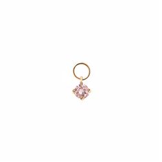 Adorn your favorite hoops with a touch of sparkle to your everyday look. Mix and match your ear-stack with tiny charms to get even more out of your staple hoops. Swap it out any time for an entirely new look. 14K Gold Pink Sapphire Stone DOES NOT FIT ALL EARRINGS, shop all matching earrings / singles Jumpring Inner Diameter 2.2mm Gemstone diameter 3mm #CS055 Dainty 14k Gold Earrings With Charms, Single Pink 14k Gold Earring, Dainty 14k Gold Charm Earrings, Tiny Charms, Tiny Charm, Ear Stack, Get Even, Sapphire Stone, Charm Earrings