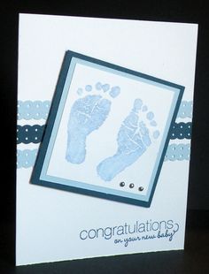 a hand and foot imprint on a card with congratulationss written in blue, white and black