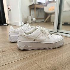 - Nike Air Force 1 Sage Low Triple White - Have Only Worn Several Times So There's No Creasing - Has Slight Staining On The Shoe As You Can See In The Photos - This Goes For $200 On Stockx Before Taxes And Shipping - I Originally Bought It For $204 - Size 7.5 - Platform Is Higher Than The Regular Air Force 1 - Super Trendy #Nike #Airforce #Sagelow #Platform #Sneakers Shoes Popular Athleisure Nike Air Force 1 Sage Low, Air Force 1 Sage Low, Shoes Popular, Platform Sneakers, Nike Air Force 1, Sneakers Shoes, White Nikes, Air Force 1, Nike Air Force