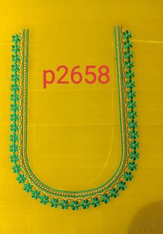 a necklace is displayed on a yellow background with the word p2538 written in red