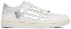 Low-top buffed, grained, cracked, and patent leather sneakers in white and metallic silver tone. · Perforated detailing at toe · Logo hardware at lace-up closure · Logo patch at padded tongue · Padded collar · Graphic appliqués at sides · Logo embossed at heel tab · Mesh lining · Treaded rubber sole Supplier color: White/Silver Amiri Sneakers, Cute Everyday Outfits, Low Sneakers, Silver Man, Sneakers White, White Silver, Leather Sneakers, Everyday Outfits, White Vintage