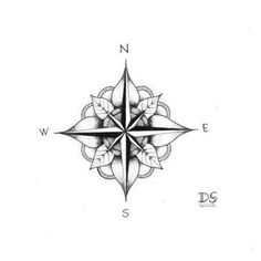 a black and white compass tattoo design