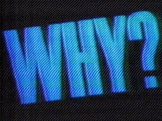 the word wnyp is lit up in blue and black with a question mark on it