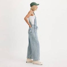 Apron Women's Overalls - Light Wash | Levi's® US Spring Utility Overalls, Casual Spring Overalls With Relaxed Fit, Levi's Spring Overalls With Pockets, Levi's Casual Overalls With Pockets, Casual Levi's Overalls With Pockets, Levi's Casual Relaxed Fit Overalls, Spring Utility Cotton Overalls, Spring Cotton Utility Overalls, Fall Utility Denim Jumpsuit Relaxed Fit