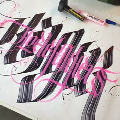 some type of lettering that is being worked on