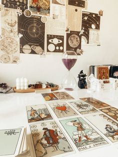 a table topped with lots of cards on top of it