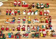 a collection of christmas figurines and ornaments on a table