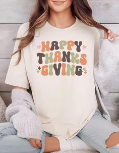 A retro letter Happy Thanksgiving T-shirt in comfort colors, perfect for celebrating the holiday season with a cozy and vintage vibe. This unisex garment-dyed tee is ideal for those looking for a relaxed and comfortable fit in a festive design. It is a must-have for Thanksgiving gatherings and fall festivities. Product features - Available in sizes S to 4XL for the perfect fit - Double-needle stitching for durability - Garment-dyed fabric for a soft texture - Made with medium fabric (6.1 oz/yd²) for lasting comfort - Relaxed fit and crew neckline for versatility Care instructions - Machine wash: cold (max 30C or 90F) - Do not bleach - Tumble dry: low heat - Iron, steam or dry: low heat - Do not dryclean Fall Festivities, Festive Design, Vintage Fall, Comfort Colors Tee, Vintage Vibe, Fall Festival, Dyed Fabric, Fall Shirts, Soft Texture