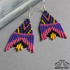 These violet purple seed bead earrings are made of high-quality Czech beads and strong synthetic thread. They are elegant, fashionable, and highly versatile, suitable for everyday wear. Features: Sterling silver components Color: pink, violet, yellow, black. This item is currently in stock. You must be completely satisfied. If you find merchandise unsatisfactory for any reason, return it within 10 days and your money will be refunded without questions. These earrings in blue and pink color https Purple Beaded Earrings With Round Beads For Festival, Festival Purple Beaded Earrings With Round Beads, Traditional Purple Beaded Earrings For Festivals, Traditional Purple Beaded Earrings, Purple Beaded Earrings With Colorful Beads, Purple Handwoven Earrings As A Gift, Purple Beaded Dangle Earrings For Festival, Purple Beaded Festival Earrings, Purple Dangle Beaded Earrings For Festival