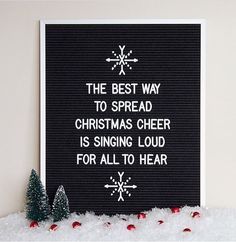 the best way to spread christmas cheer is singing loud for all to hear on this sign