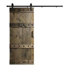 an open wooden door with metal hardware on the bottom and side bars in front of it