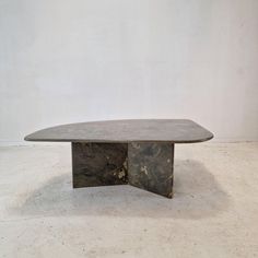 a table that is made out of marble