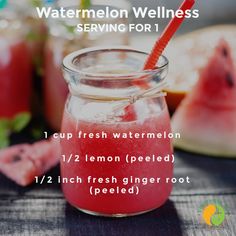 a jar filled with watermelon sitting on top of a table