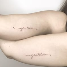 two women with matching tattoos on their arms that say, guatemala and guatitas