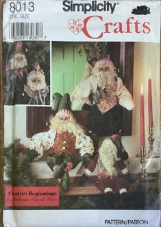 the front cover of a pattern book with two santas sitting on a bench and holding candles