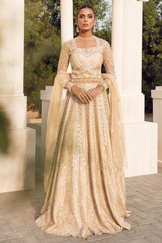 Elegant Lehenga With Naqshi For Festive Occasions, Elegant Naqshi Lehenga For Festive Occasions, Formal Semi-stitched Naqshi Sharara, Dabka Embellished Wedding Suits With Traditional Drape, Traditional Drape Wedding Suits With Dabka, Formal Gown With Resham Embroidery For Eid, Wedding Suits With Dabka And Traditional Drape, Festive Long Sleeve Gown For Ceremonies, Elegant Anarkali Set With Traditional Drape For Ceremony