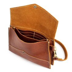 Portland Leather Good's Envelope Convertible Crossbody purse comes with both crossbody and wristlet clutch strap. Perfect for carrying essentials for an evening out! Comes with built in wallet with four card slots.