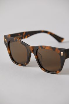 The NON brings heritage characteristics to a sleek modern frame. A soft sweeping brow with Internal faceting has created one of our most comfortable silhouettes. Drawing inspiration from the great Bob Dylan who famously wore similarly styled eyewear throughout his career.The NON is understated, clean and mysterious. Modern Tortoiseshell Sunglasses For Everyday, Modern Tortoiseshell Wayfarer Sunglasses, Classic Brown Cat Eye Sunglasses With Square Frame, Brown Cat Eye Sunglasses With Square Frame For Everyday, Everyday Brown Cat Eye Sunglasses With Square Frame, Silhouettes Drawing, Eye Strain, Bob Dylan, Polarized Lenses