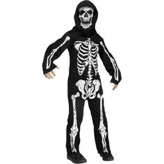 a boy in a skeleton costume is standing with his hands out and looking at the camera