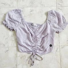 - Open To Offers! Lovely Purple Gingham Crop Top From Hollister! I Love The Ruched Design And Puffy Sleeves - New With Tags; Never Worn - Not Sold In Stores Anymore :( - Super Soft And Stretchy - No Flaws/Smells - Smoke & Pet Free Home - I Cross-Post Items,, They Sell Quickly! - Every Purchase Comes With A Freebie~ Let Me Know If You Want One :)) - I Have So Many Items In My Closet! Pick And Bundle For Bigger Discount! Trendy Plaid V-neck Top, Summer Gingham Top For Day Out, Casual Summer Plaid Tops, Casual Plaid Summer Tops, Summer V-neck Top For Picnic, Trendy Cotton Tops For Picnics, Gingham V-neck Top For Day Out, Trendy Fitted Gingham Top, Fitted Gingham V-neck Top