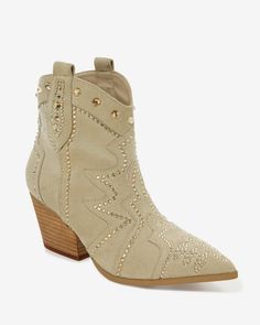 Our Embellished Western Bootie is your chic companion for transitioning into next season. With a pointed-toe design and block heel, it effortlessly blends fashion with comfort. Embellishments add a touch of flair, ensuring you step out in on-trend, Western-inspired style. | Mia - Stone Neutral - Embellished Western Bootie - 6.0 Chic Studded Block Heel Shoes, Chic Studded Block Heel, Chic Embellished Boots With Block Heel, Chic Snip Toe Heels For Fall, Chic Fall Snip Toe Heels, Embellished Boots For Formal Spring Occasions, Chic Embellished Heels For Winter, Elegant Embellished Block Heel Boots, Embellished Heels For Formal Occasions In Fall