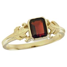 Indulge in the timeless allure of this vintage-inspired ring, a testament to refined elegance. Delicately crafted and embellished with a deep red, emerald-cut garnet stone, nestled within a radiant yellow gold band that gleams with luxurious allure. With every glance, this exquisite ring promises to enchant and mesmerize, a symbol of timeless beauty and unmatched sophistication. CHARACTERISTICS Status: Made to order Origin: Thailand Metal: Solid 9K Yellow Gold Ring Size: US 3-8 Total Gemstones W Garnet Color, Vintage Inspired Rings, Garnet Stone, Gold Band, Yellow Gold Rings, Solitaire Ring, Deep Red, Emerald Cut, Vintage Stil