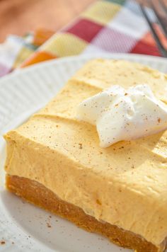 a piece of cake sitting on top of a white plate