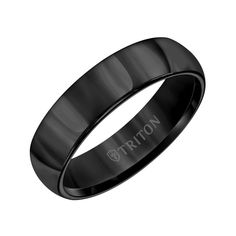 a black ceramic ring with the word triton engraved on it's center and an inscription