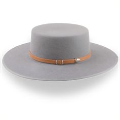 Description Materials Craftsmanship Hat Care Shipping Returns Product Description Bold Grey Wide Brim Flat Top Cowboy Hat Transform your look with the Tycoon, a grey wide brim flat top cowboy hat that combines bold style with practical benefits. Crafted from luxurious rabbit fur felt, this hat features a flat crown and a 3 5/8" wide steel-wired bound brim, providing excellent sun protection and a distinctive appearance. The leather hat belt adds a touch of rustic elegance, while the genuine leat Mens Felt Hats, Spanish Hat, Homburg Hat, Outdoor Hut, Gambler Hat, The Raid, Mens Hats Fashion, Fedora Hat Men, Homburg