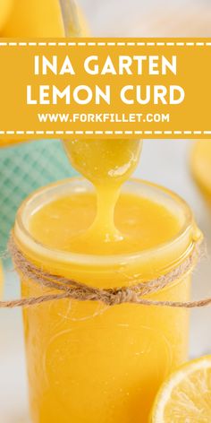 a jar filled with lemon curd sitting on top of a table