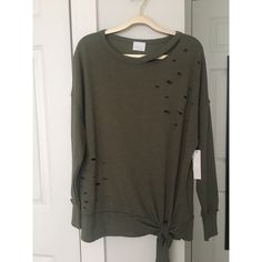 Brand New. Unworn. Still Has The Tag Attached. The Label Says Size Xs, But The Sweater Itself Is Actually Pretty Large And Is Arguably A M. Material Is Super Soft; The Inside Is Made Of A Fleecy Material To Keep The Wearer Warm! :) Distressed Long Sleeve Tops For Spring, Spring Long Sleeve Distressed Top, Distressed Tops For Spring Loungewear, Spring Distressed Tops For Loungewear, Spring Distressed Loungewear Tops, Trendy Long Sleeve Distressed Tops, Distressed Long Sleeve Tops For Fall, Distressed Long Sleeve Tops For Loungewear, Trendy Distressed Green Tops