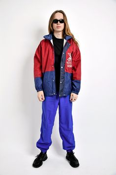 "Vintage men's windbreaker shell jacket in red blue colour. Size - L. Model is 187 cm / 6ft 1.6\" tall and usually wears size M. Good vintage condition. All orders are shipped every day Worldwide from EU. Safe registered standard delivery Worldwide with courier and tracking number. You can also choose super fast 1-4 days DHL Express delivery. Just choose shipping upgrade in your cart.❗️Don't forget to write your phone number. It will be used only for delivery. SHIPPING TIME & COST Here you can c Functional Red Streetwear Windbreaker, Red Functional Windbreaker For Streetwear, Functional Red Windbreaker For Streetwear, Red Hooded Raincoat For Outdoor, Blue Waterproof Windbreaker For Streetwear, Blue Hooded Streetwear Raincoat, Blue Hooded Raincoat For Streetwear, Wind Coat, Adidas Retro